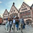 IEC Young Professionals Camp 2025 Legs up in front of Frankfurt’s Römer