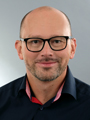 Portraitfoto Andreas Bäumler
